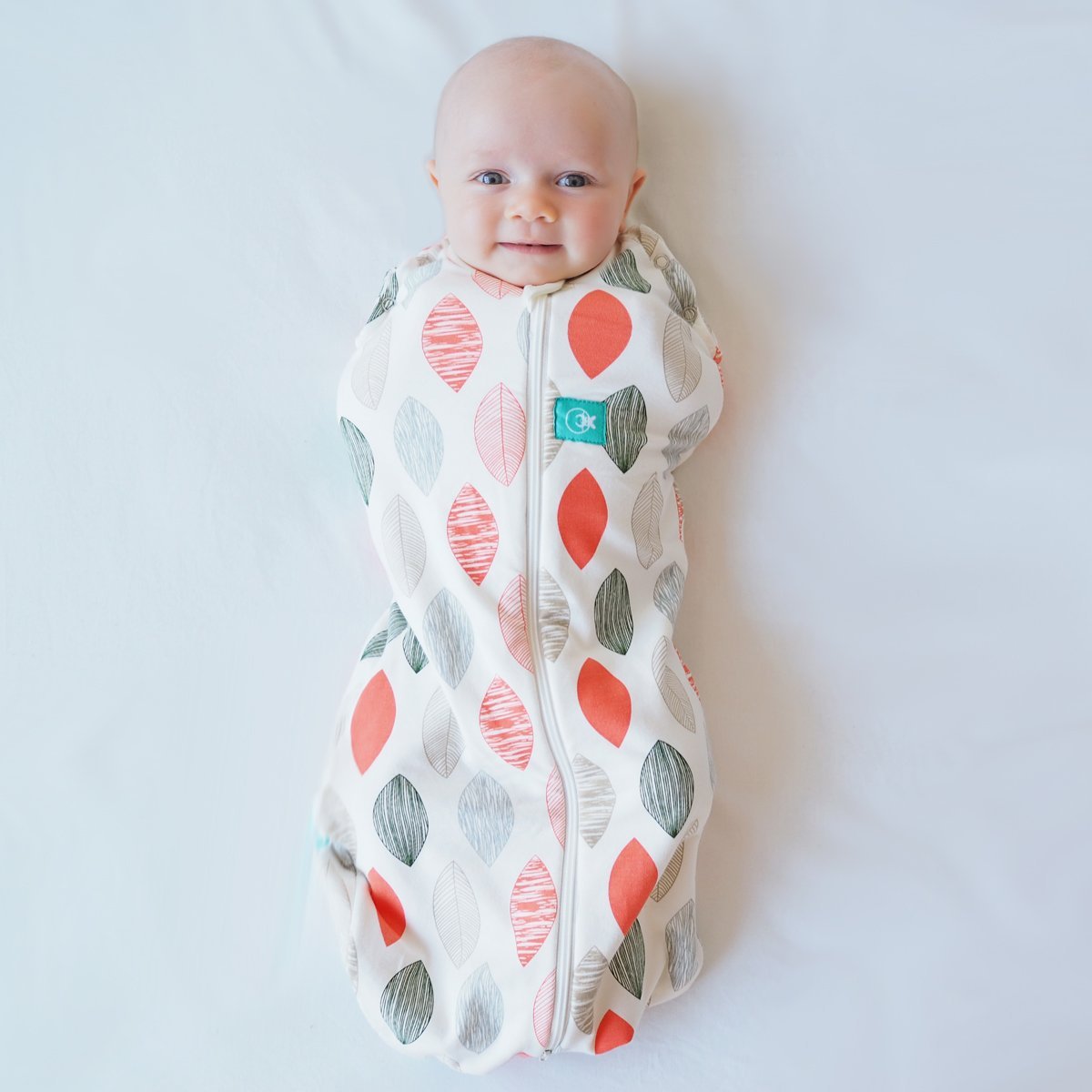 ergoPouch Cocoon Swaddle Sack 0.2 TOG – Baby Sleep Sack, Gentle Snug Fit Helps Calm Startle Reflex, Ideal for Arms In/Out Sleeping, Soft Breathable Fabric for Better Sleep (3-6 Months, Blush Leaf)